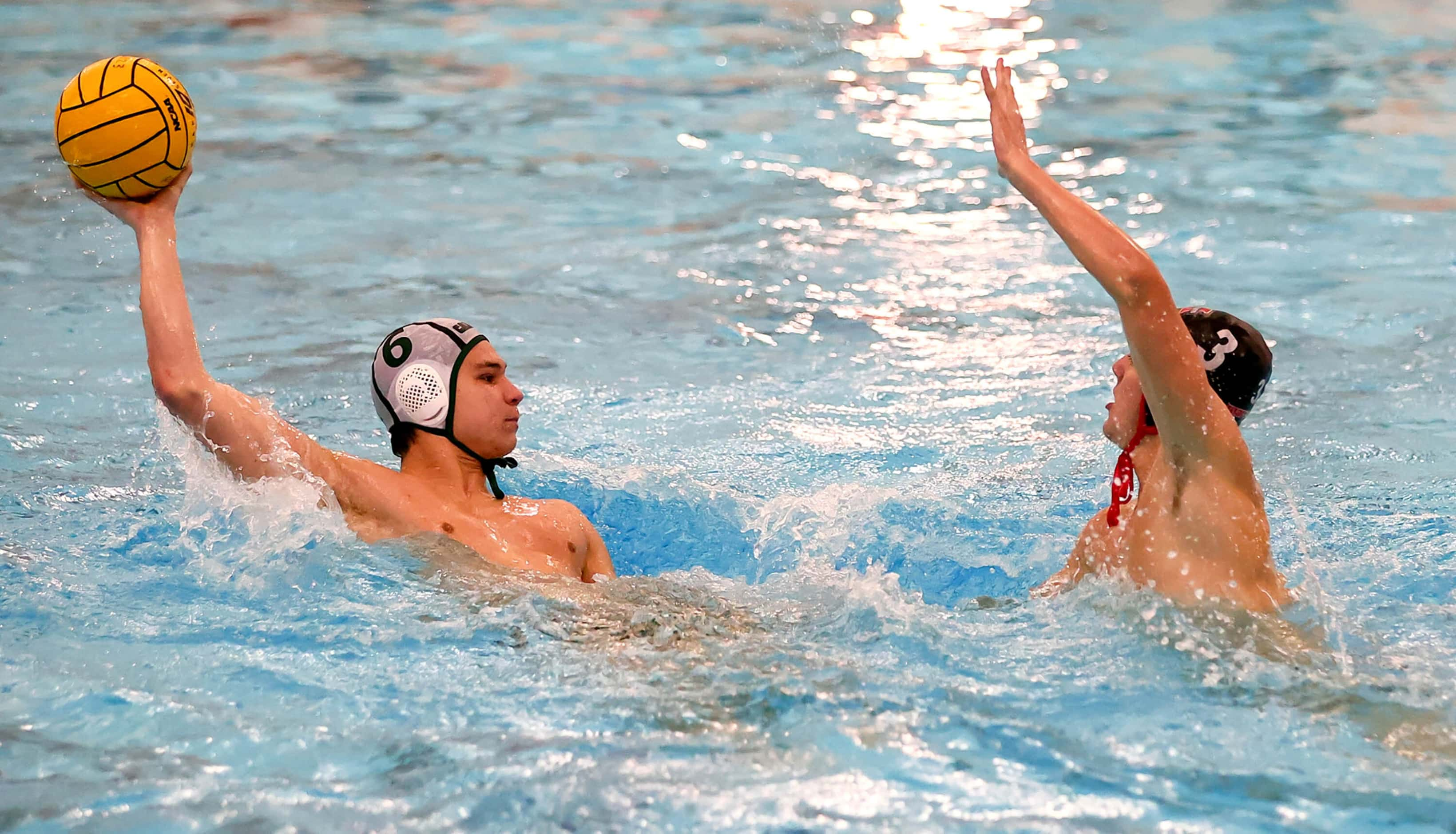 Southlake Carroll's Royce McBride (6) looks to pass against Flower Mound Marcus' Asher...