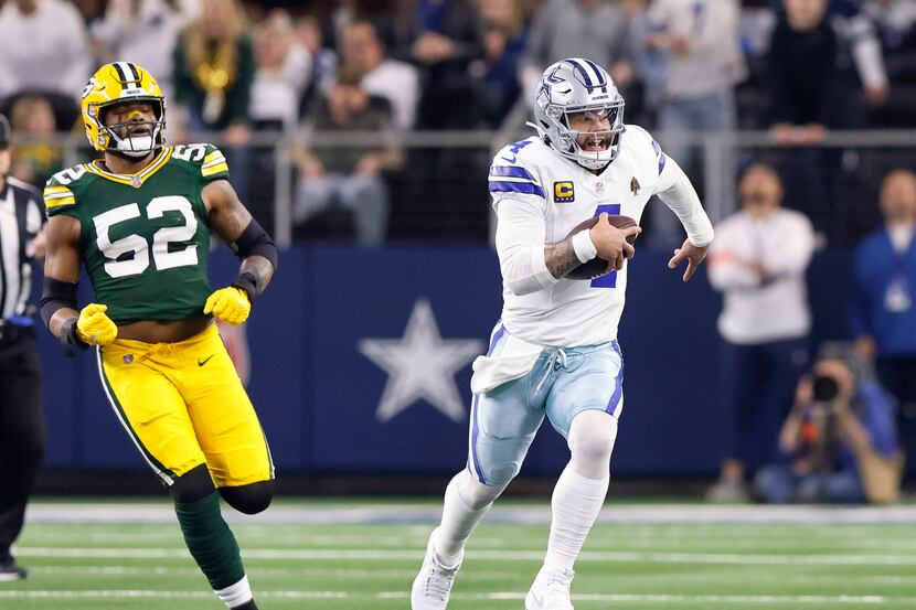 Dallas Cowboys quarterback Dak Prescott (4) races down the field as Green Bay Packers...