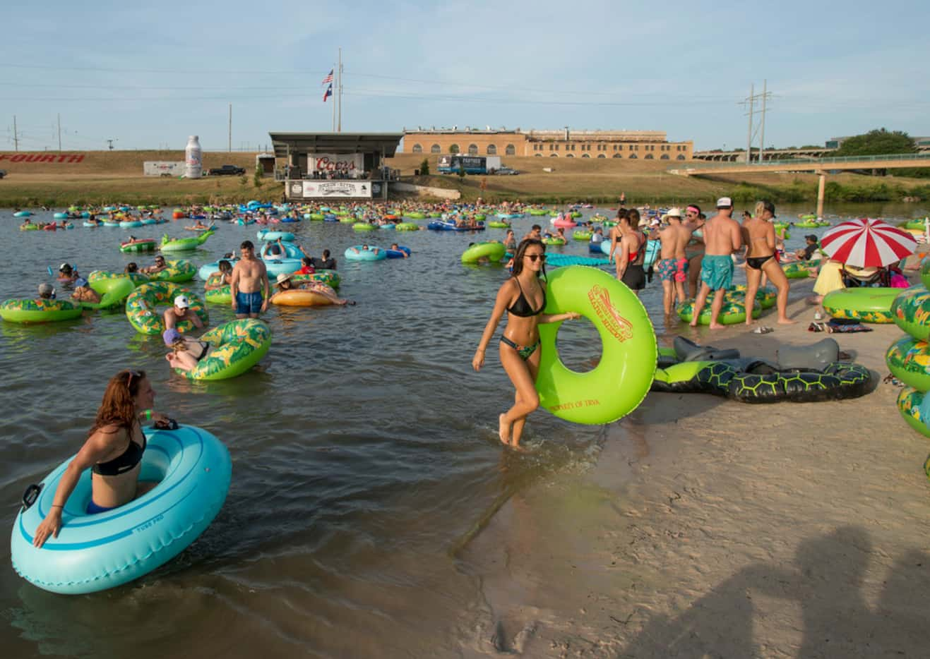 The Trinity River on the cusp of downtown Fort Worth is packed with tubers during Rockin'...