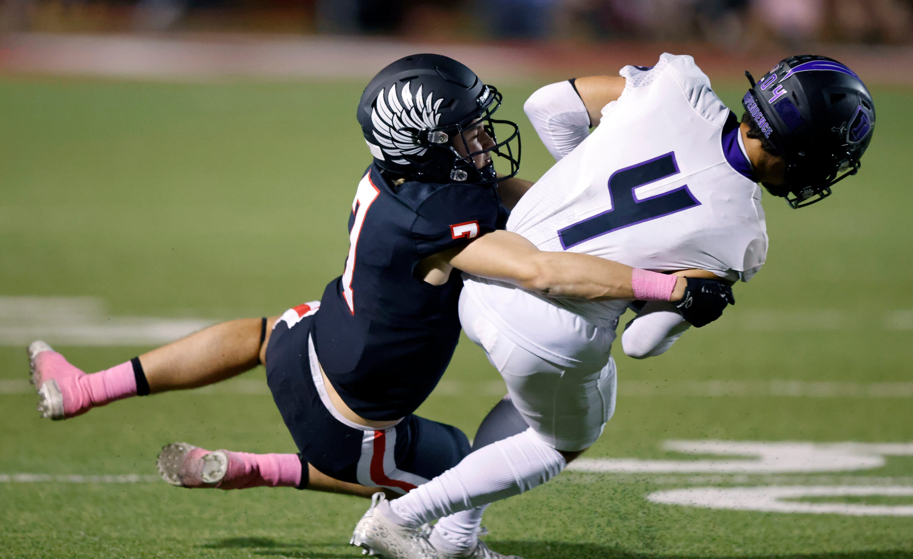 Argyle defensive back Micah Roberts (7) tackles Frisco Independence receiver Landon Neeley...