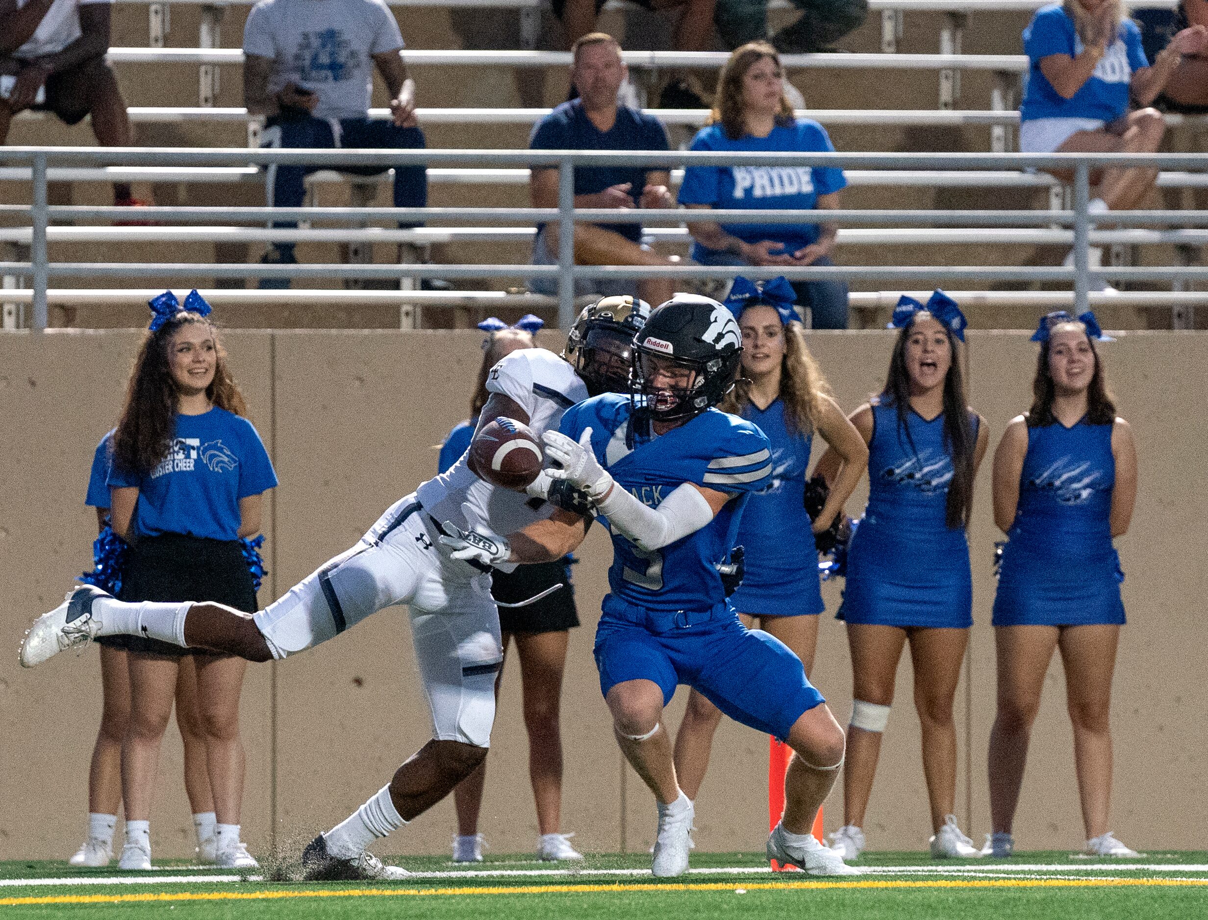 Little Elm senior defensive back Keyshon Mills (7) breaks up a would-be touchdown pass...