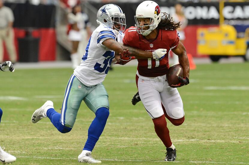 GLENDALE, AZ - AUGUST 17:  Larry Fitzgerald #11 of the Arizona Cardinals runs with the ball...