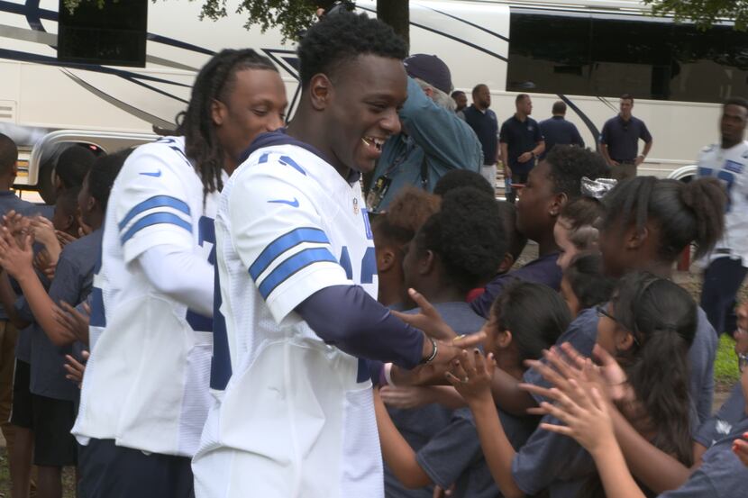 Cowboys rookie receiver Michael Gallup greets students at Skyview Elementary School on...