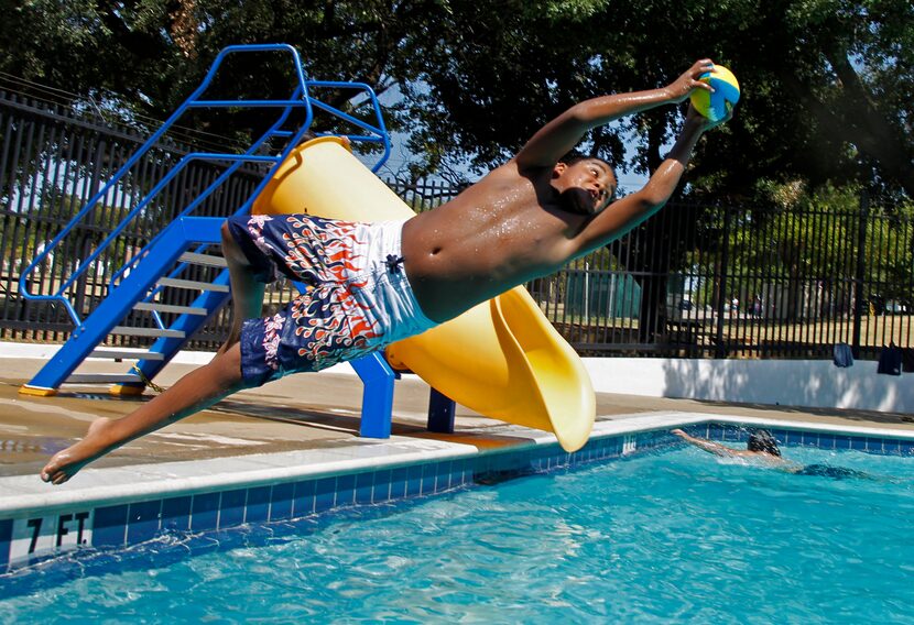 Jonathan Ranjil, 10, plays with friends at Martin Weiss Park in Dallas on Aug. 17, 2011. It...