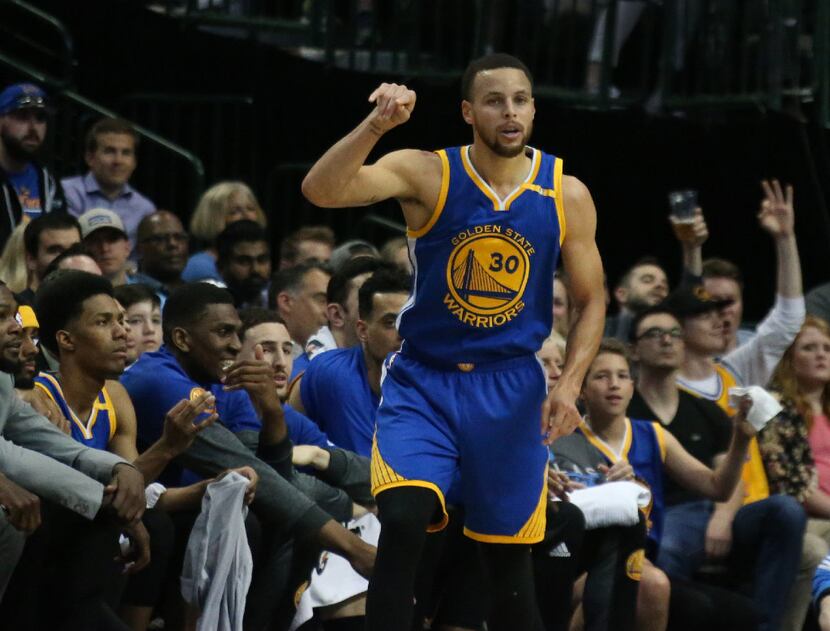 Golden State Warriors guard Stephen Curry (30) gestures after hitting a three-point shot...