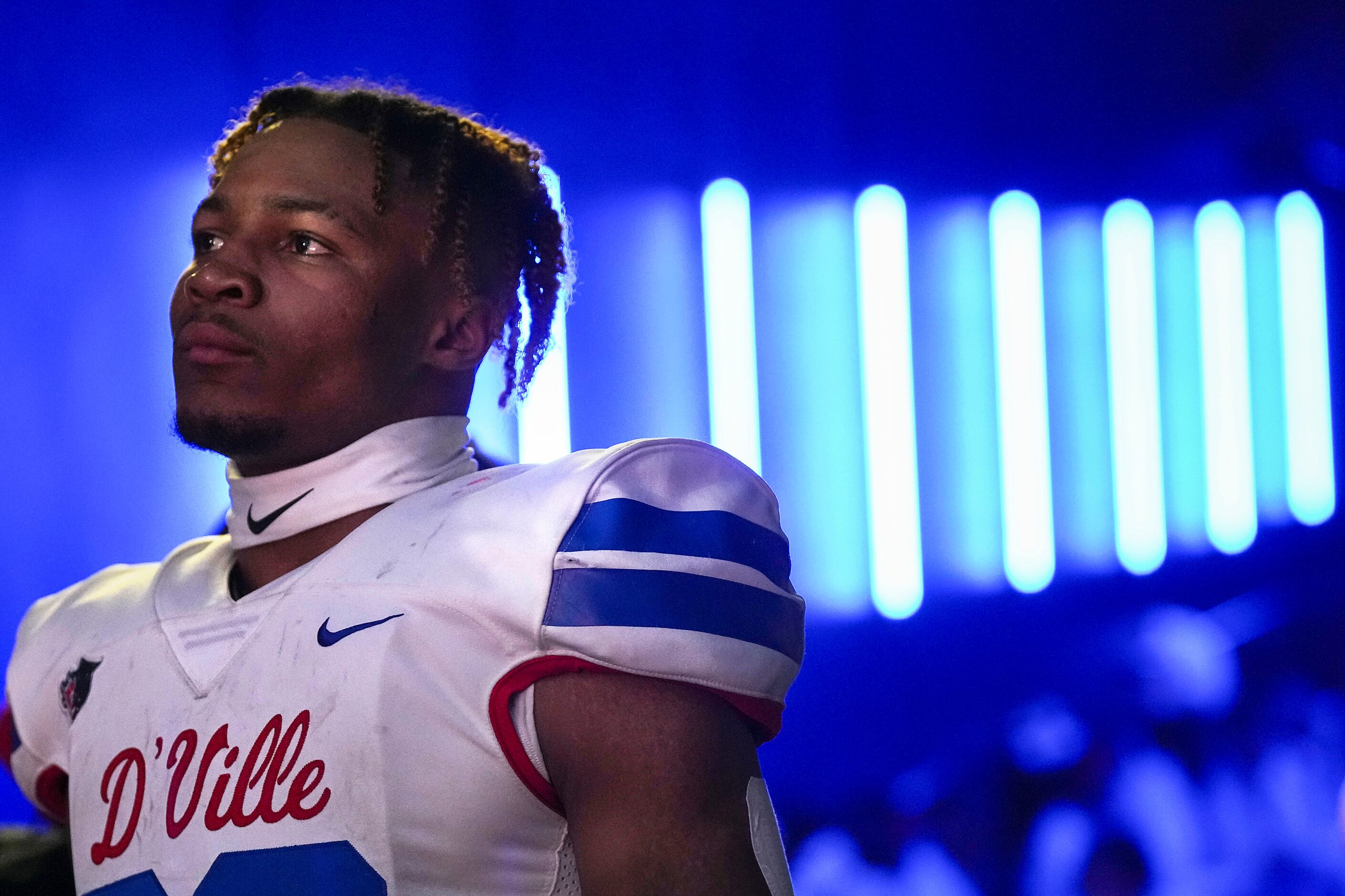 Duncanville running back Caden Durham looks out from the tunnel during a lightning delay in...