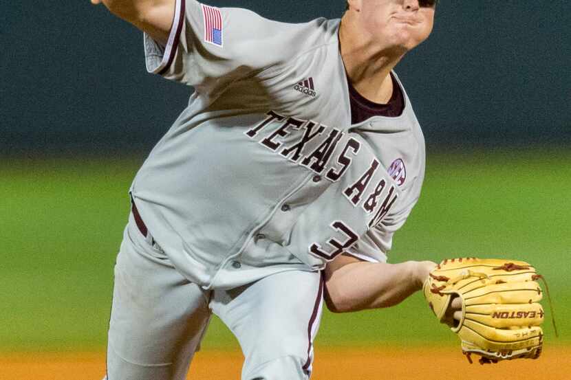 Texas A&M's Grayson Long pitches against Alabama during an NCAA college baseball game...