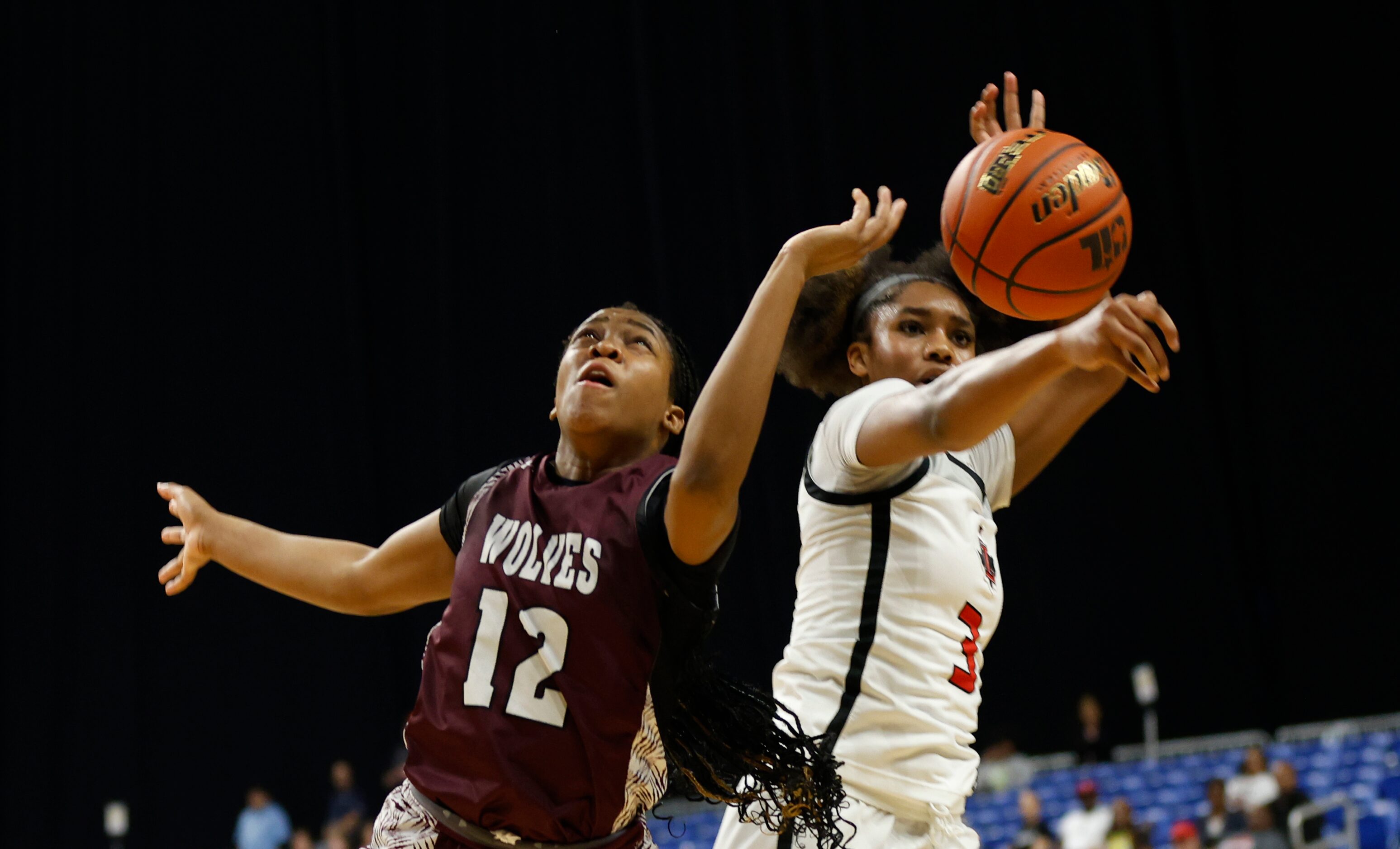 Frisco Liberty's Jacy Abii (3) blocks a shot from Mansfield Timberview's Chrishawn Coleman...