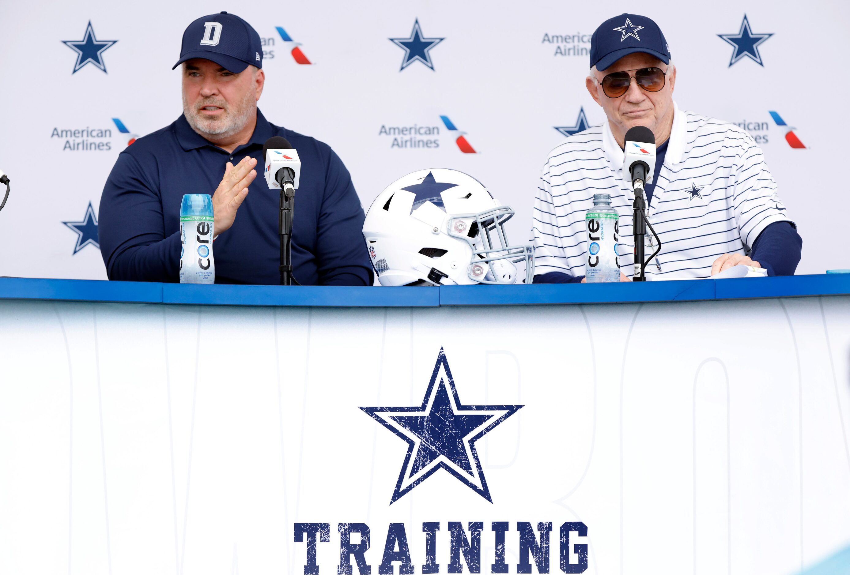 Dallas Cowboys head coach Mike McCarthy (left) answers questions alongside owner Jerry Jones...