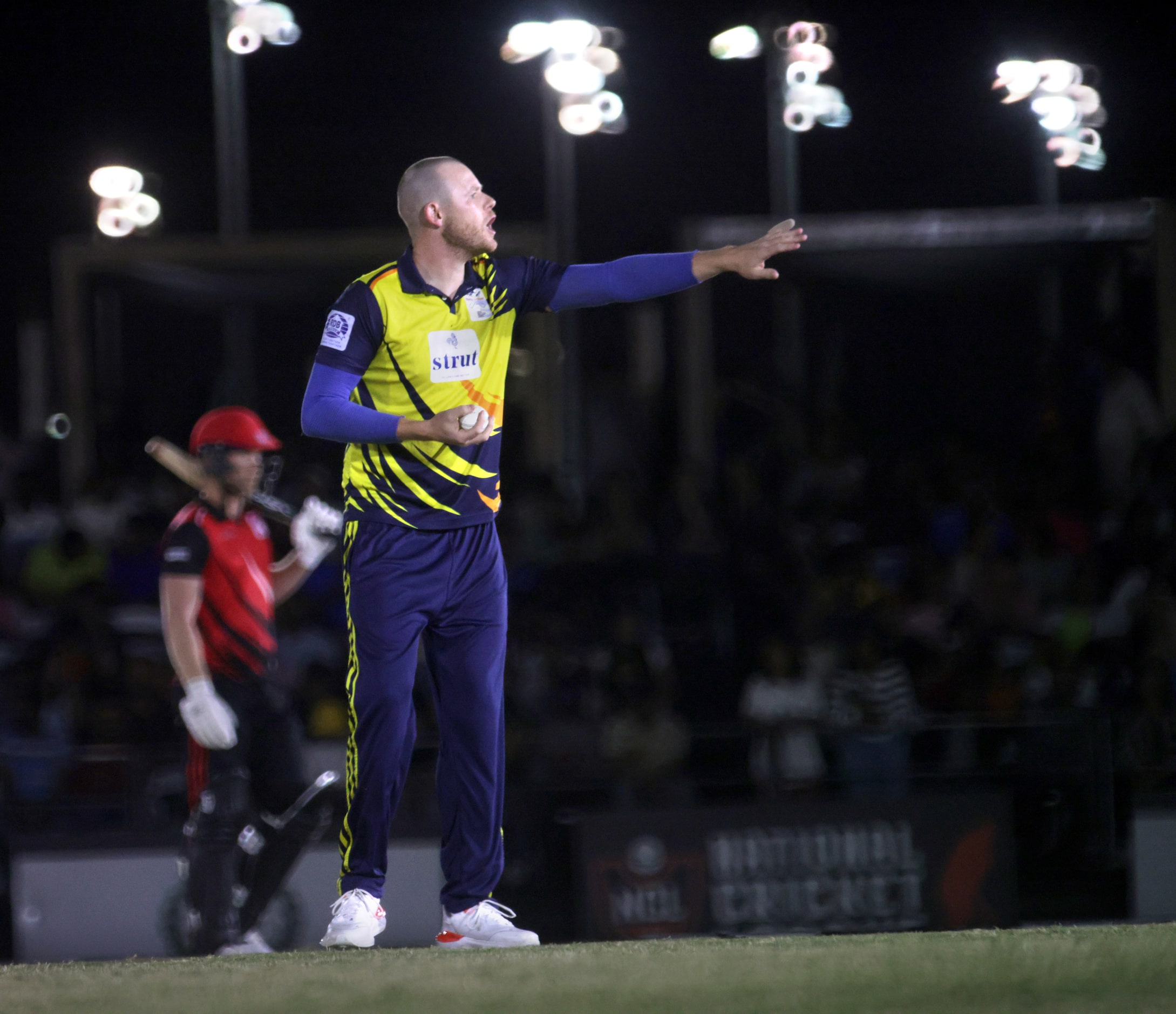 Chicago player #21 Michael Leask yells to his teammates as The Chicago Cricket Club plays...