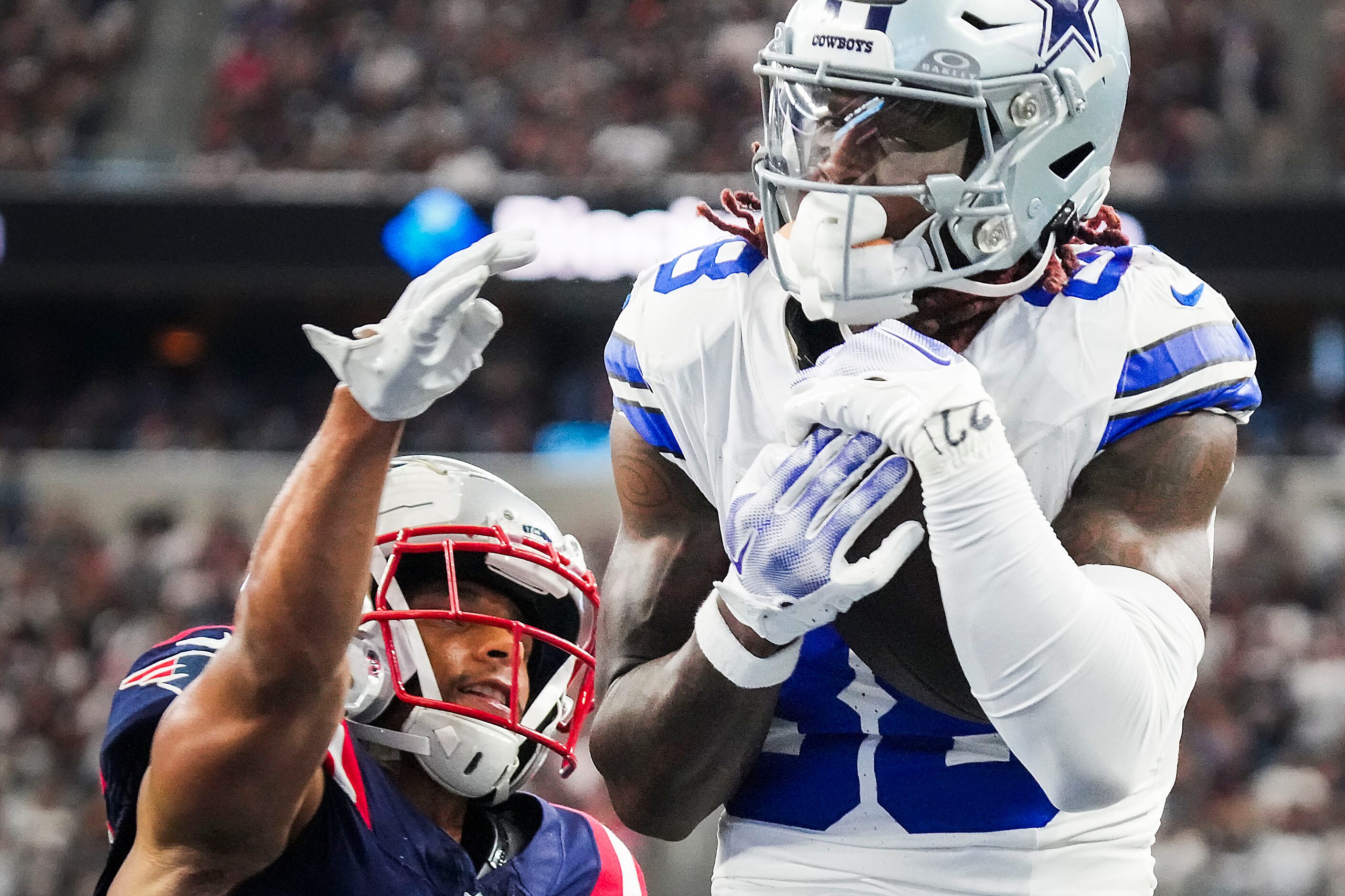 Dallas Cowboys wide receiver CeeDee Lamb (88) catches a touchdown  pass over New England...