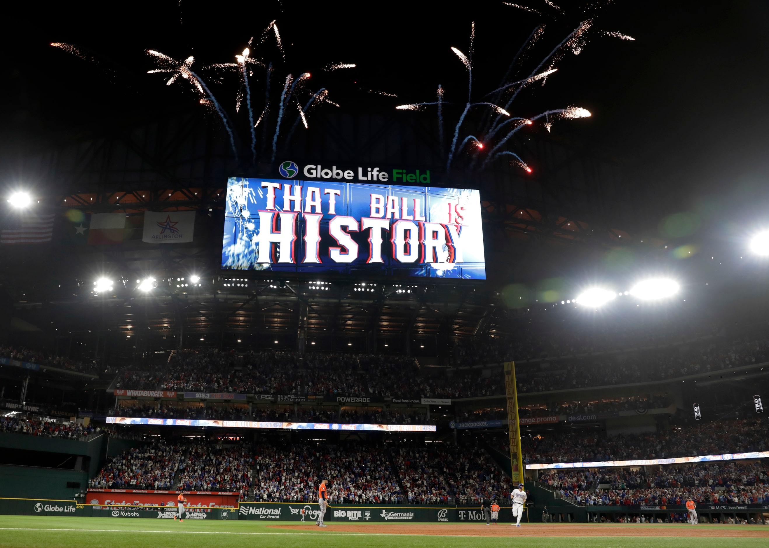 Fireworks explode as Texas Rangers batter Corey Seager (5) turns second on his third inning...