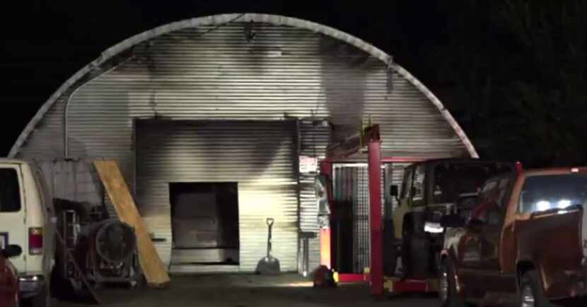 The fire charred a warehouse belonging to an auto body shop, fire officials say.