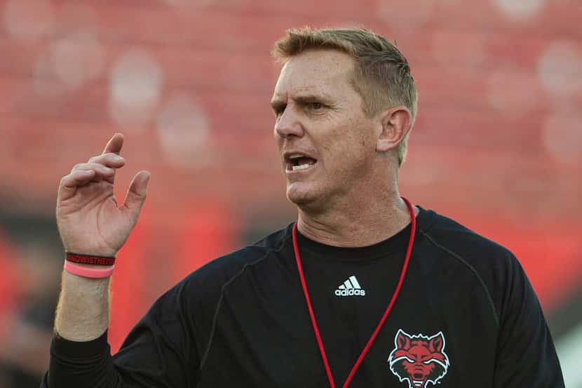 Arkansas State coach Blake Anderson speaks during the NCAA college football team's scrimmage...