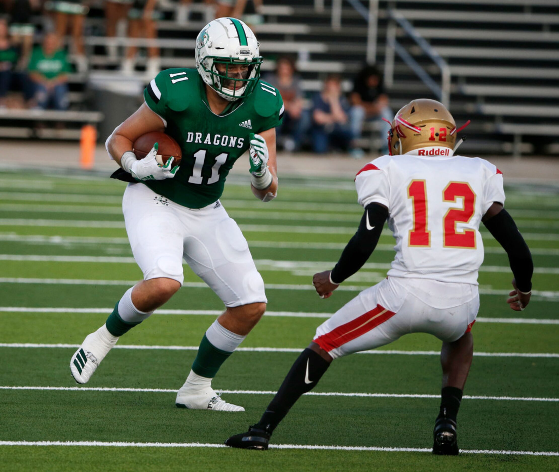 Southlake Carroll's Blake Smith (11)  tries to get past South Grand Prairies Keiondre McGhee...