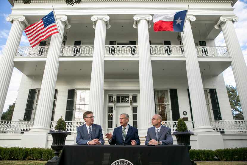 From left, Texas Lt. Gov. Dan Patrick, Texas Gov. Greg Abbott and House Speaker Dennis...