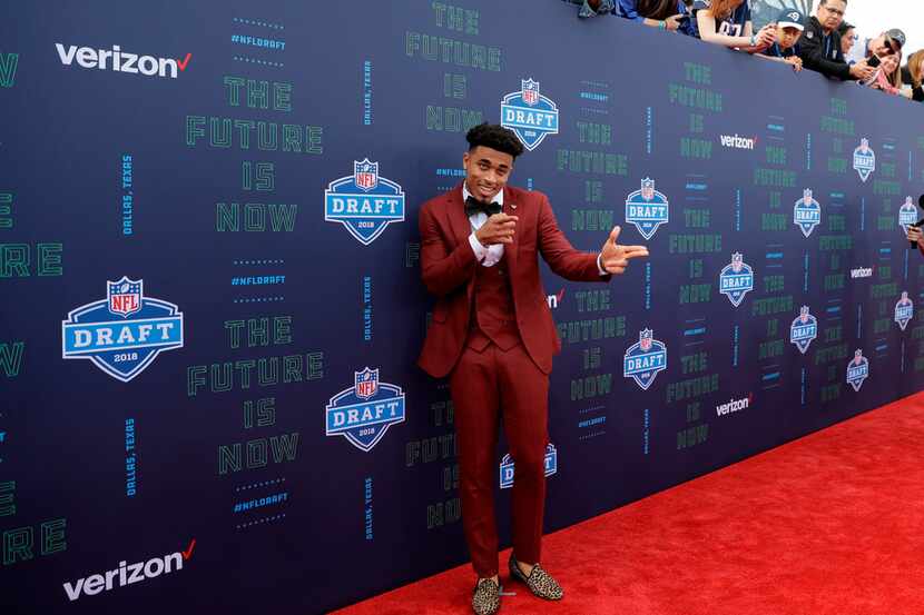 Louisville's Jaire Alexander poses for photos on the red carpet before the first round of...