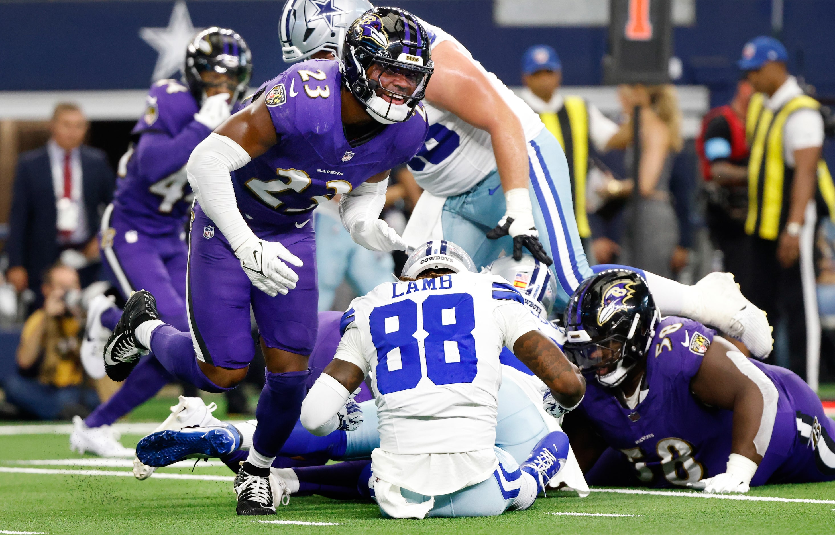 Baltimore Ravens linebacker Trenton Simpson (23) celebrates after Dallas Cowboys wide...