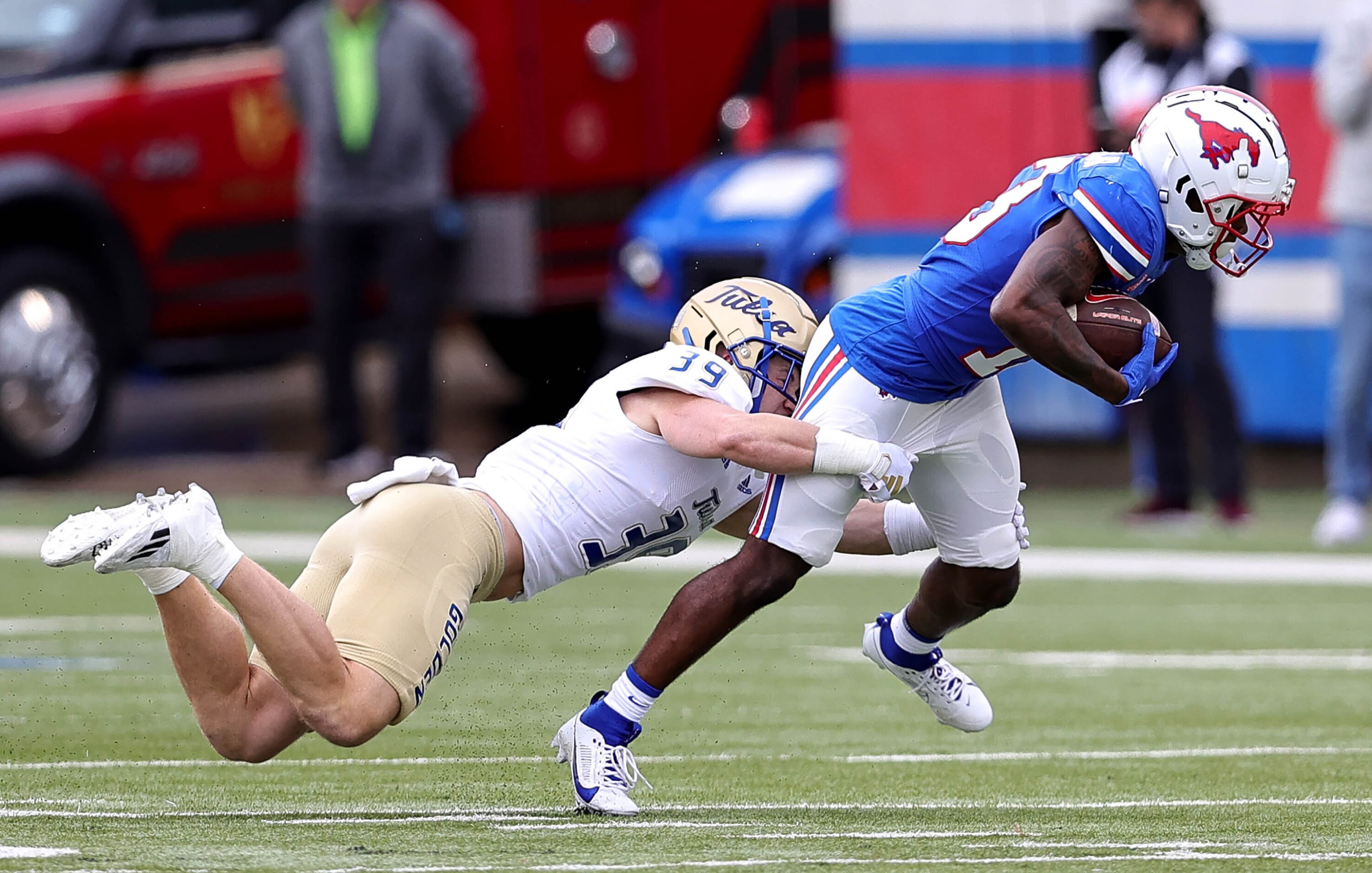 SMU wide receiver Roderick Daniels Jr comes up with a reception against Tulsa safety Dayne...