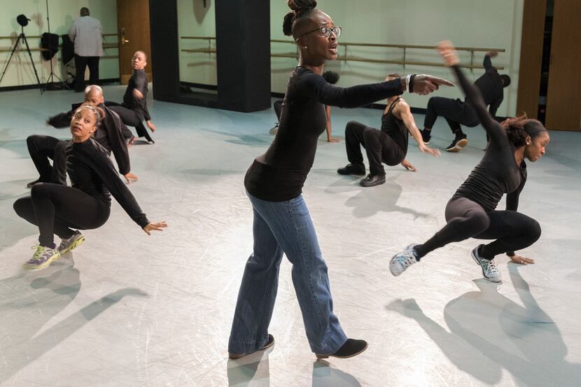 Dallas Black Dance Theatre rehearses Displaced, Yet Rebirthed.  The piece, premiering...