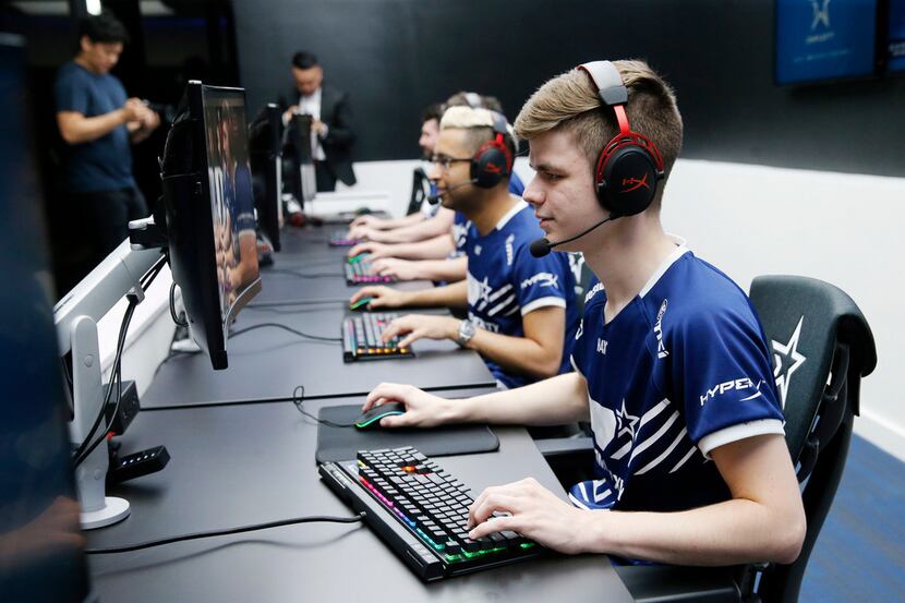 Complexity Gaming's Hunter "Sick" Mims plays a game along with teammates during the grand...