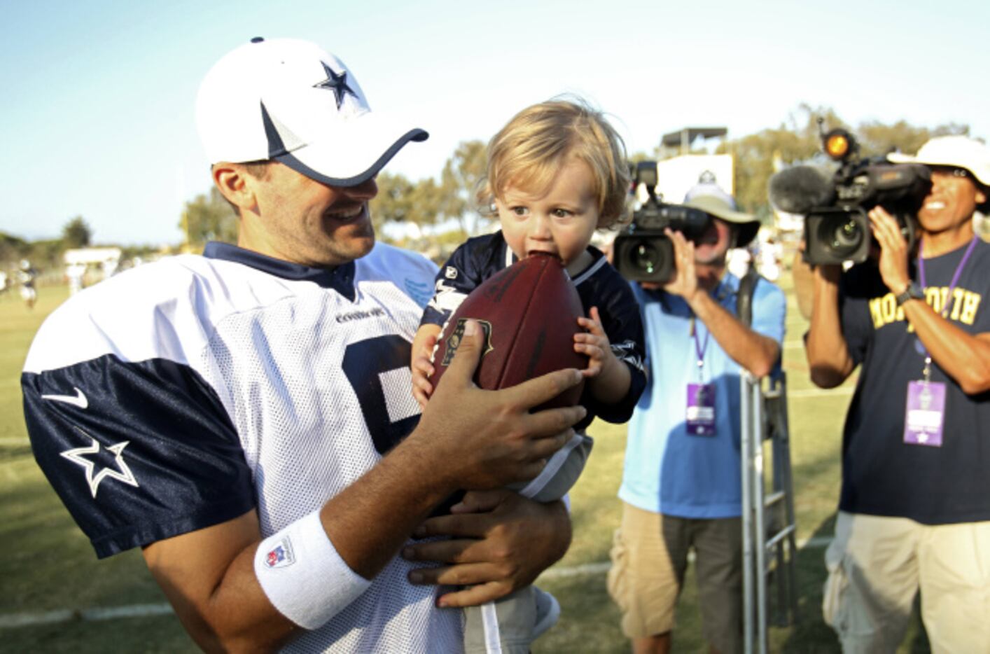 Dallas Cowboys star Tony Romo shows off son Hawkins in matching  sportswear