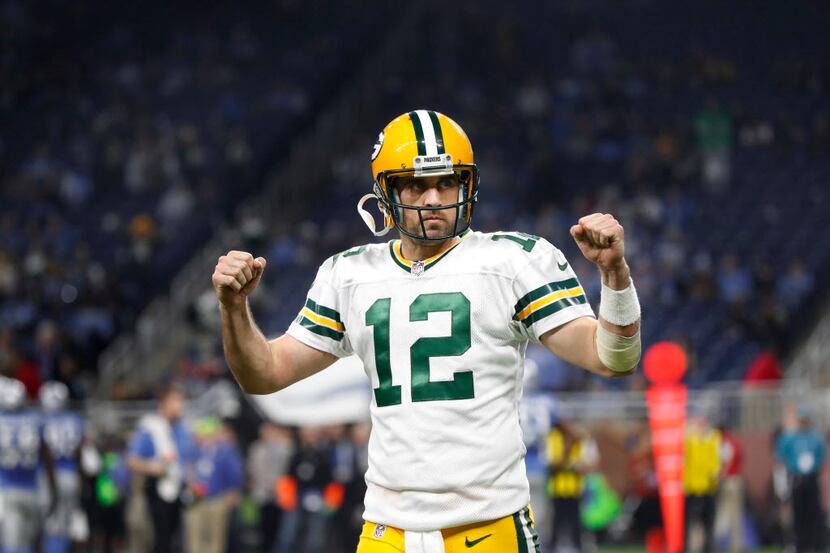 Green Bay Packers quarterback Aaron Rodgers (12) celebrates against the Detroit Lions during...