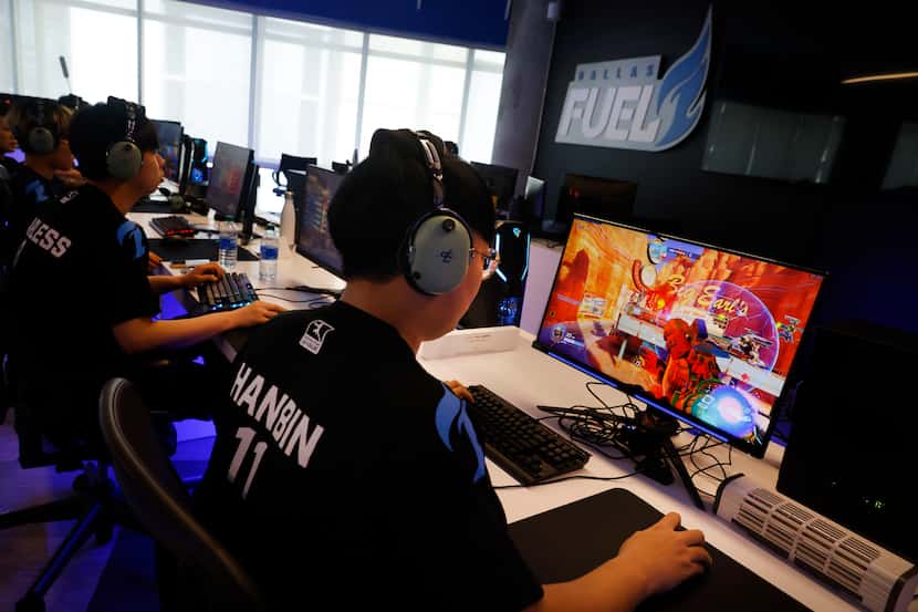 Dallas Fuel Overwatch League player Hanbeen ‘Hanbin’ Choi practices with his teammates ahead...