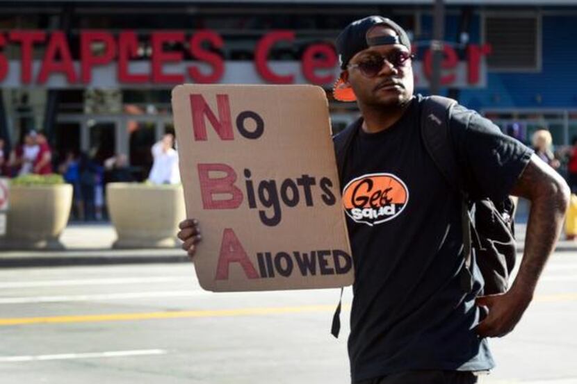 A protester exercised his free-speech right Tuesday in Los Angeles to respond to Clippers...