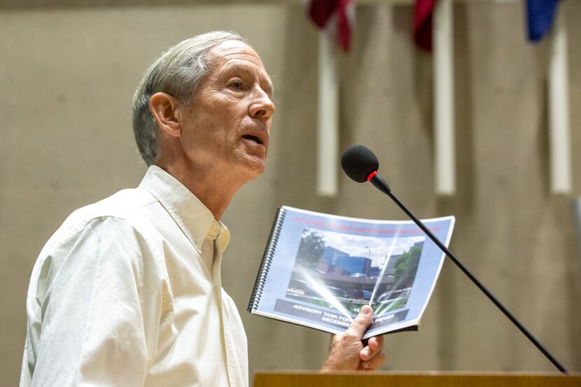 Steve Dawson speaks in opposition to Planned Development 15 at the city council meeting on...