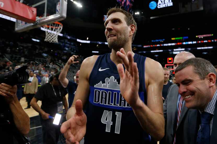 Dallas Mavericks forward Dirk Nowitzki (41) walks off the court after the game against the...
