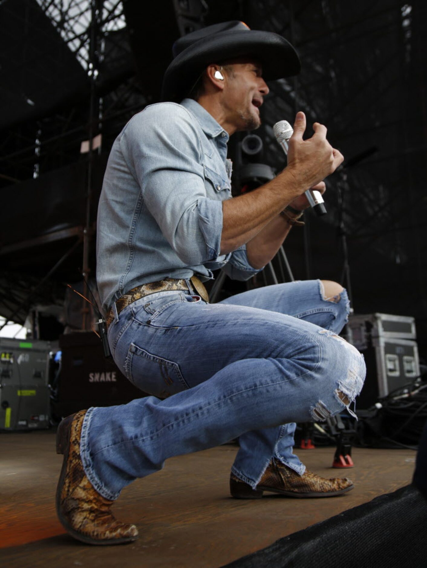 Tim McGraw sings during his performance at the March Madness Music Festival at Reunion Park...