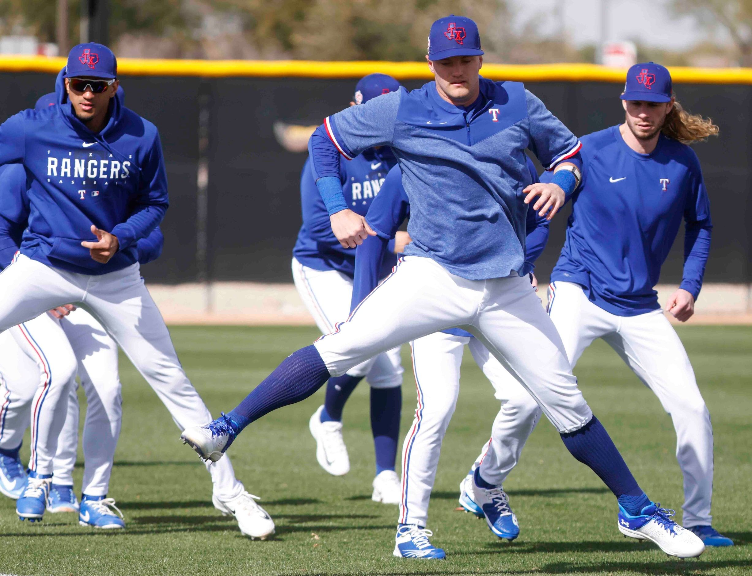 Texas Rangers outfielder Bubba Thompson, left, infielder Josh Jung, center, and outfielder...