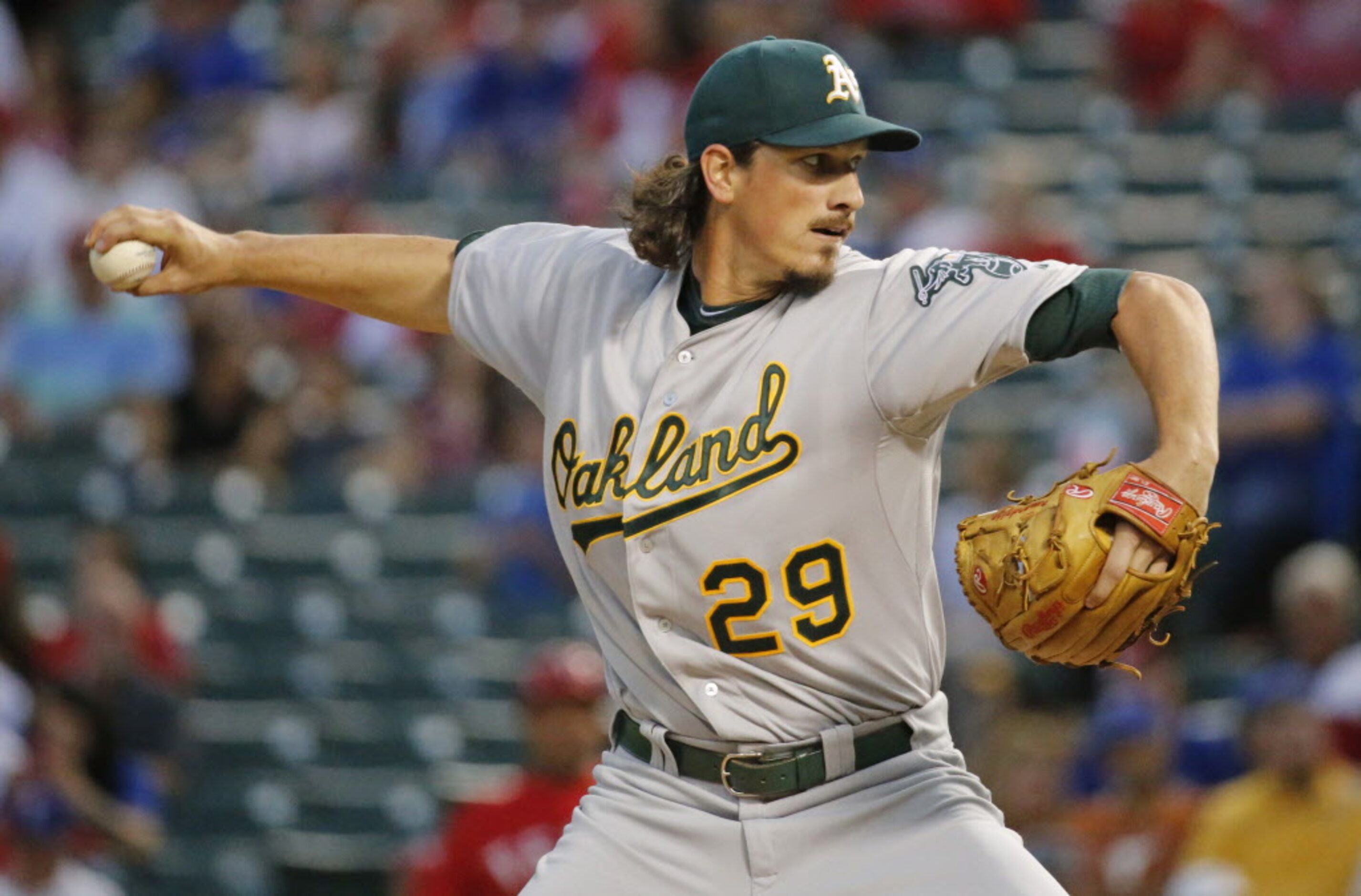 Oakland starting pitcher Jeff Samardzija throws a first inning pitch during the Oakland...