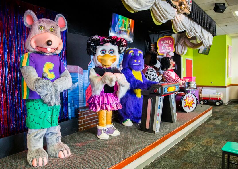 Animatronic characters dance on a stage at Chuck E Cheese on Wednesday, April 8, 2015 in...
