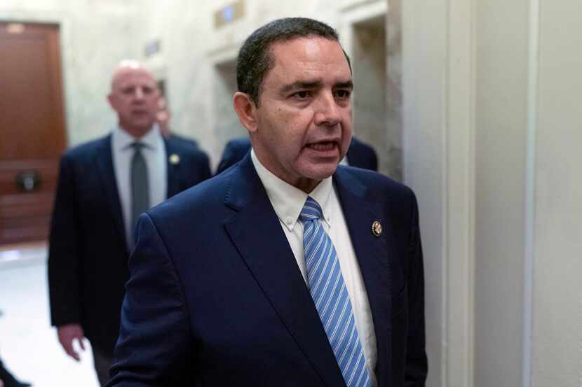 U.S. Rep. Henry Cuellar, D-Laredo, walks to the House chamber to vote on Capitol Hill,...