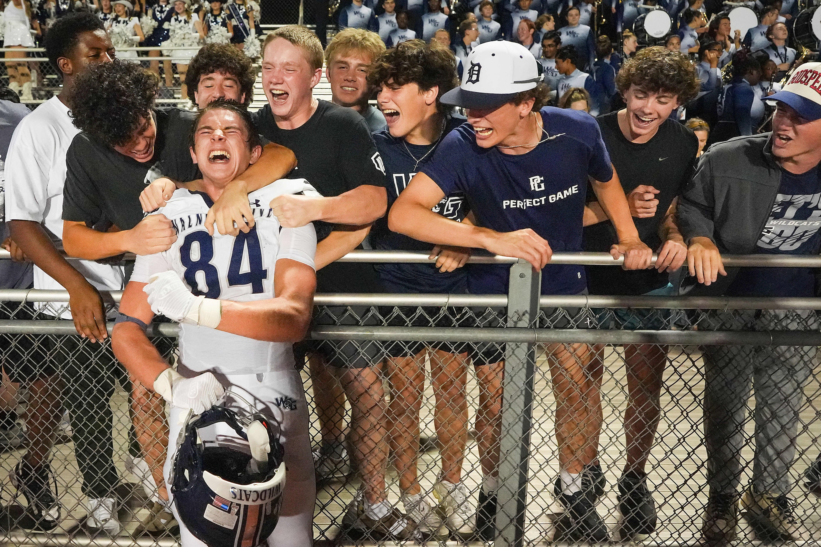 Prosper Walnut Grove wide receiver Hayden Cooley (84) celebrates with fans after a 29-28...