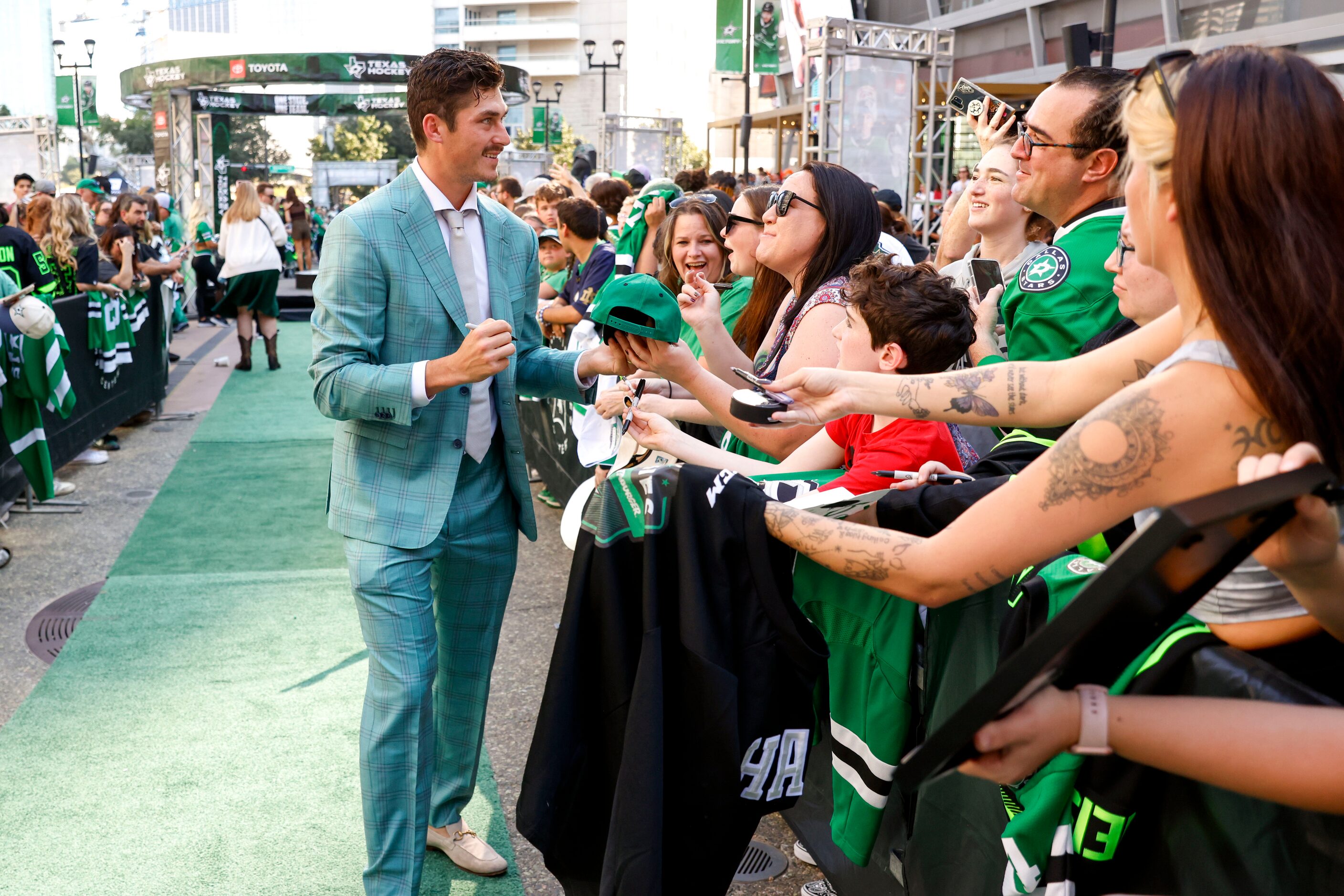 Dallas Stars left wing Mason Marchment interacts with the crowd during the team’s home...