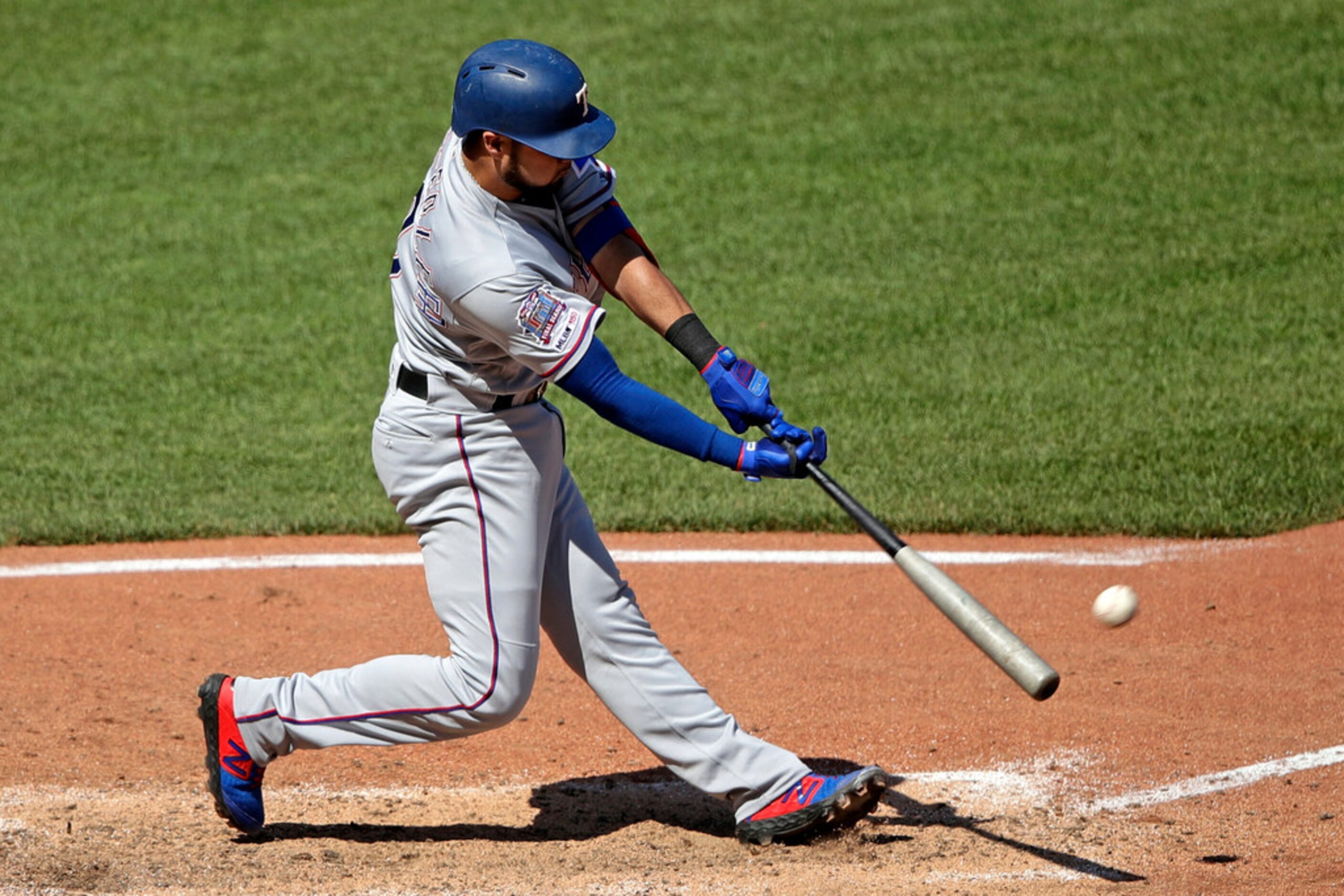 Texas Rangers' Isiah Kiner-Falefa drives in a run with a double off Pittsburgh Pirates...