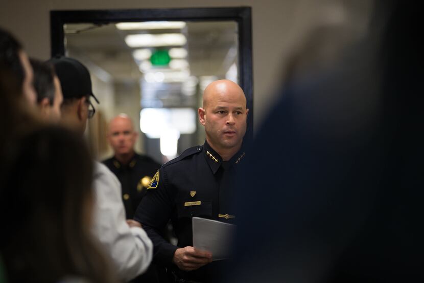 San Jose Police Chief Eddie Garcia, center, walks into a press conference at the San Jose...