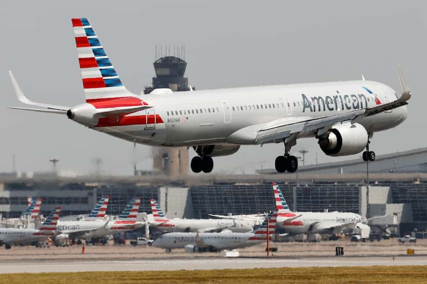 An American Airlines flight arrives at Dallas Fort Worth International Airport, Thursday,...