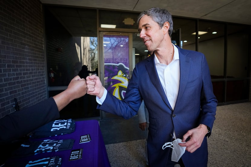 Democratic candidate for governor Beto O'Rourke first bumps a supporter after meeting with...