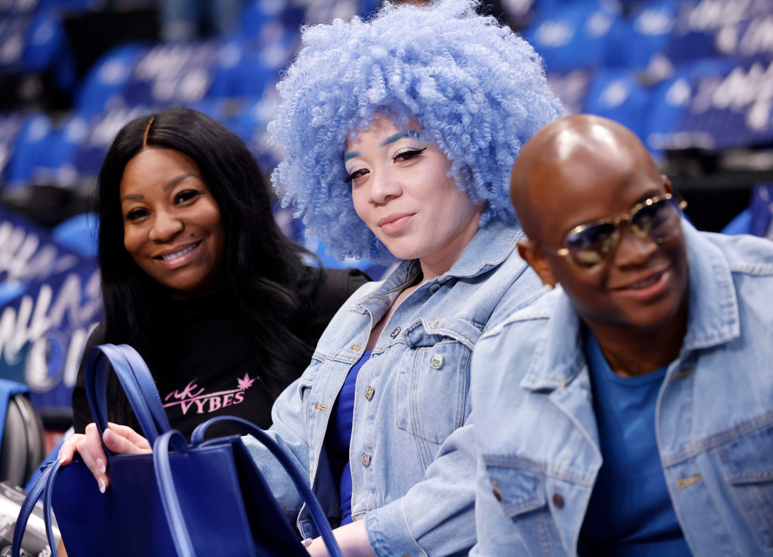 Angel White (center) camerawomen ready for Game 5  with her best friend April Watson before...