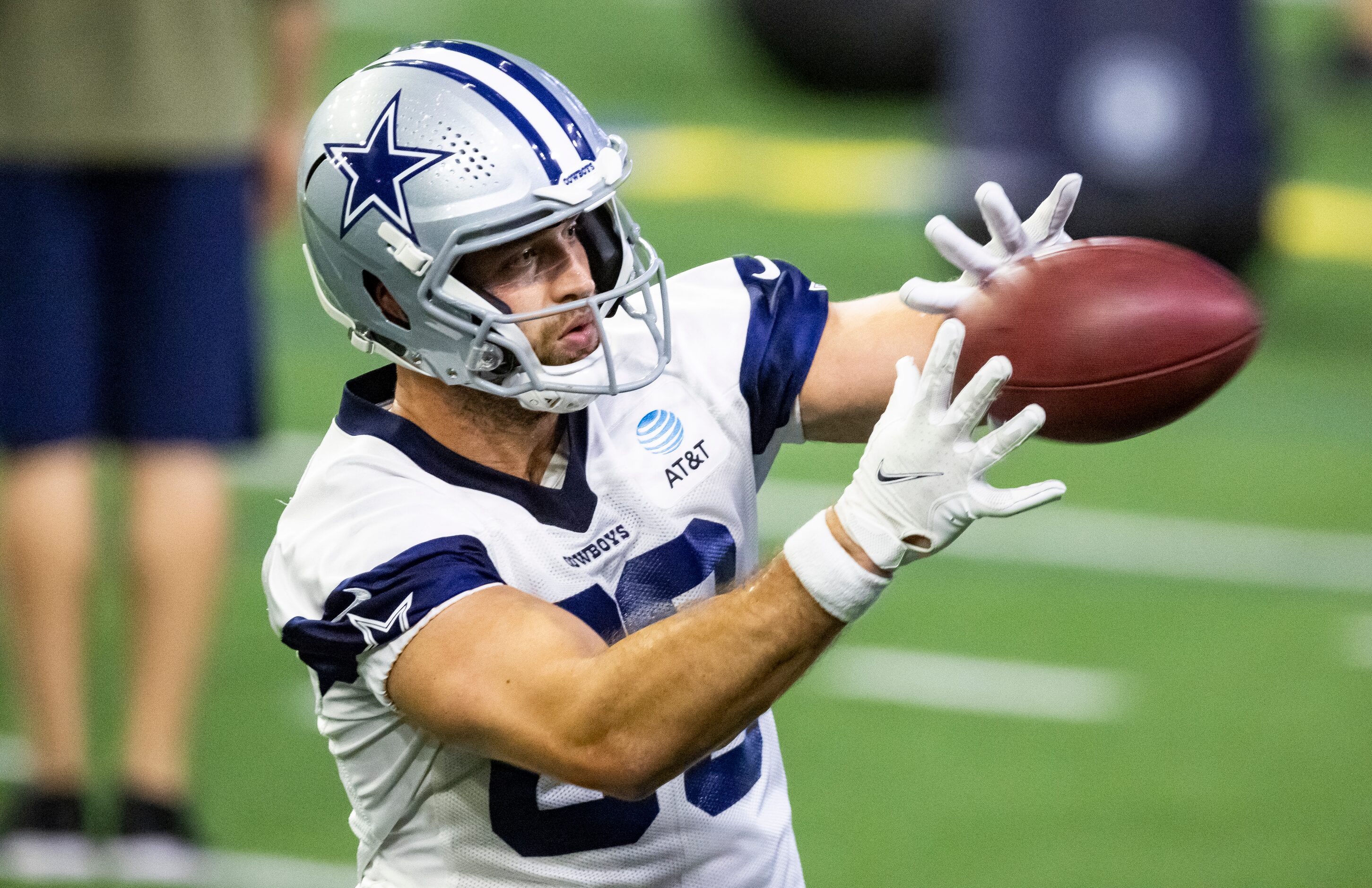 Dallas Cowboys tight end Ian Bunting catches a pass during practice at The Star in Frisco,...