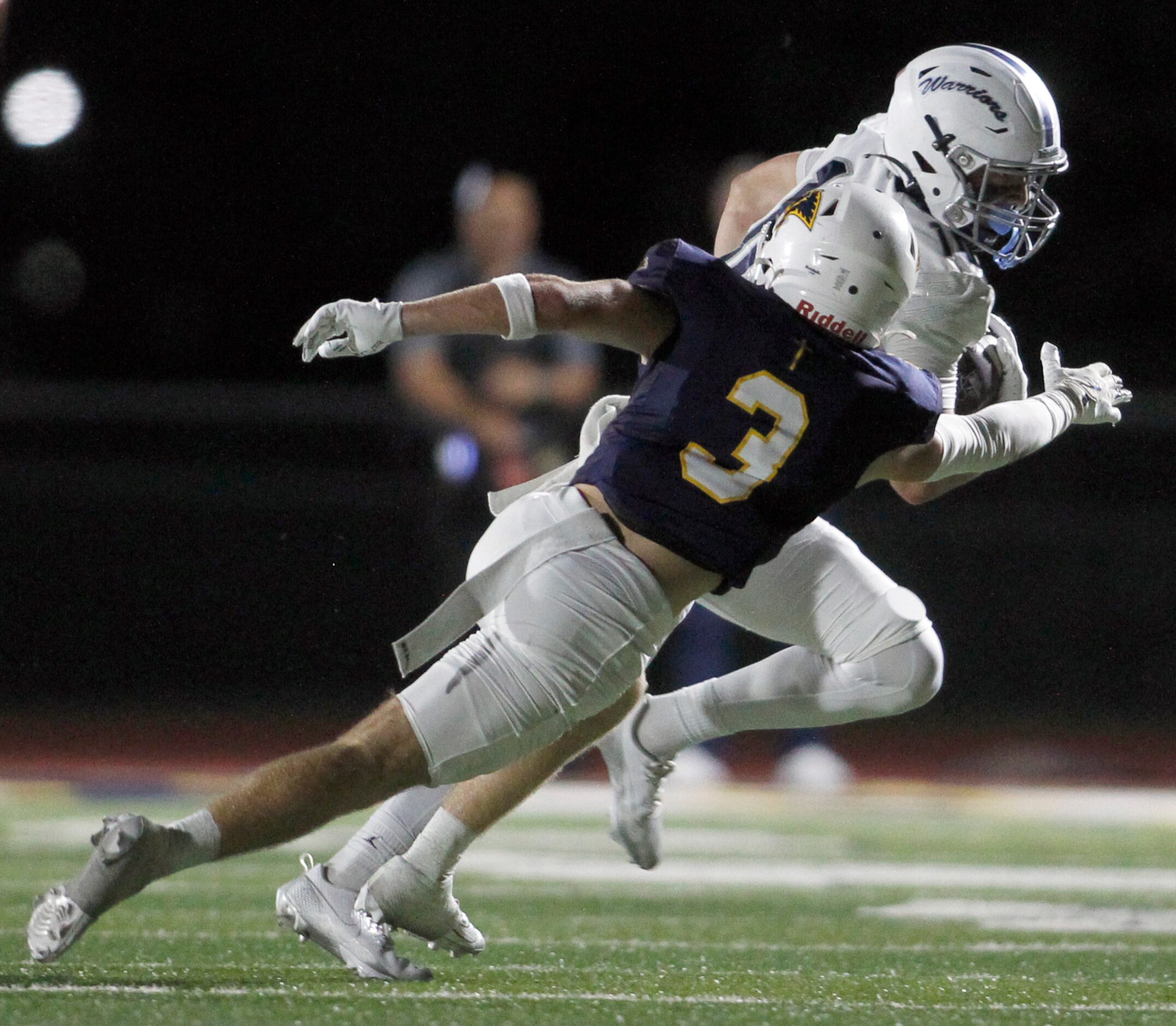 Argyle Liberty Christian receiver Brady Janusek (10), background, tacks on extra yards after...