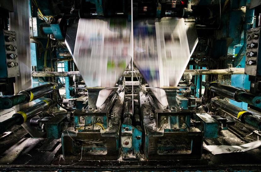 Presses roll at The News' printing plant in Plano. Several other publications, including USA...