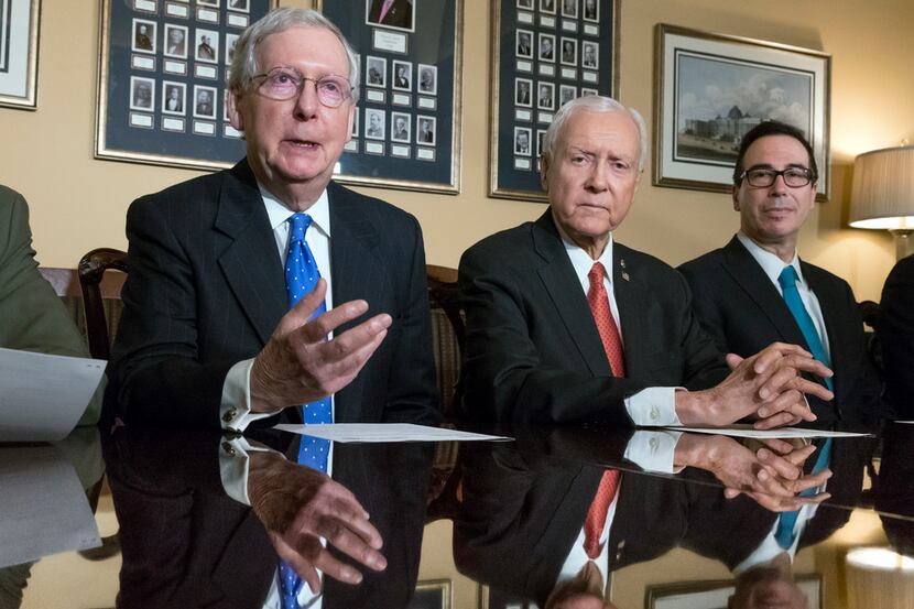 In this Nov. 9, 2017, file photo, from left, Senate Majority Leader Mitch McConnell, R-Ky.,...