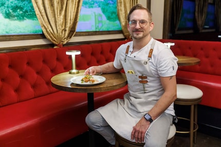 Consulting chef Eric Freidline is pictured with the jalapeño cheddar corn dog at Boxcar....