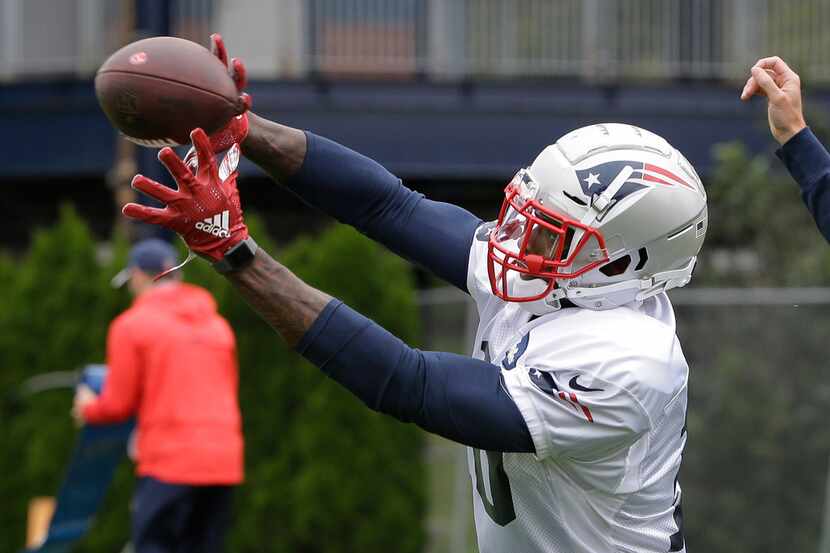 New England Patriots wide receiver Josh Gordon catches the ball during an NFL football...