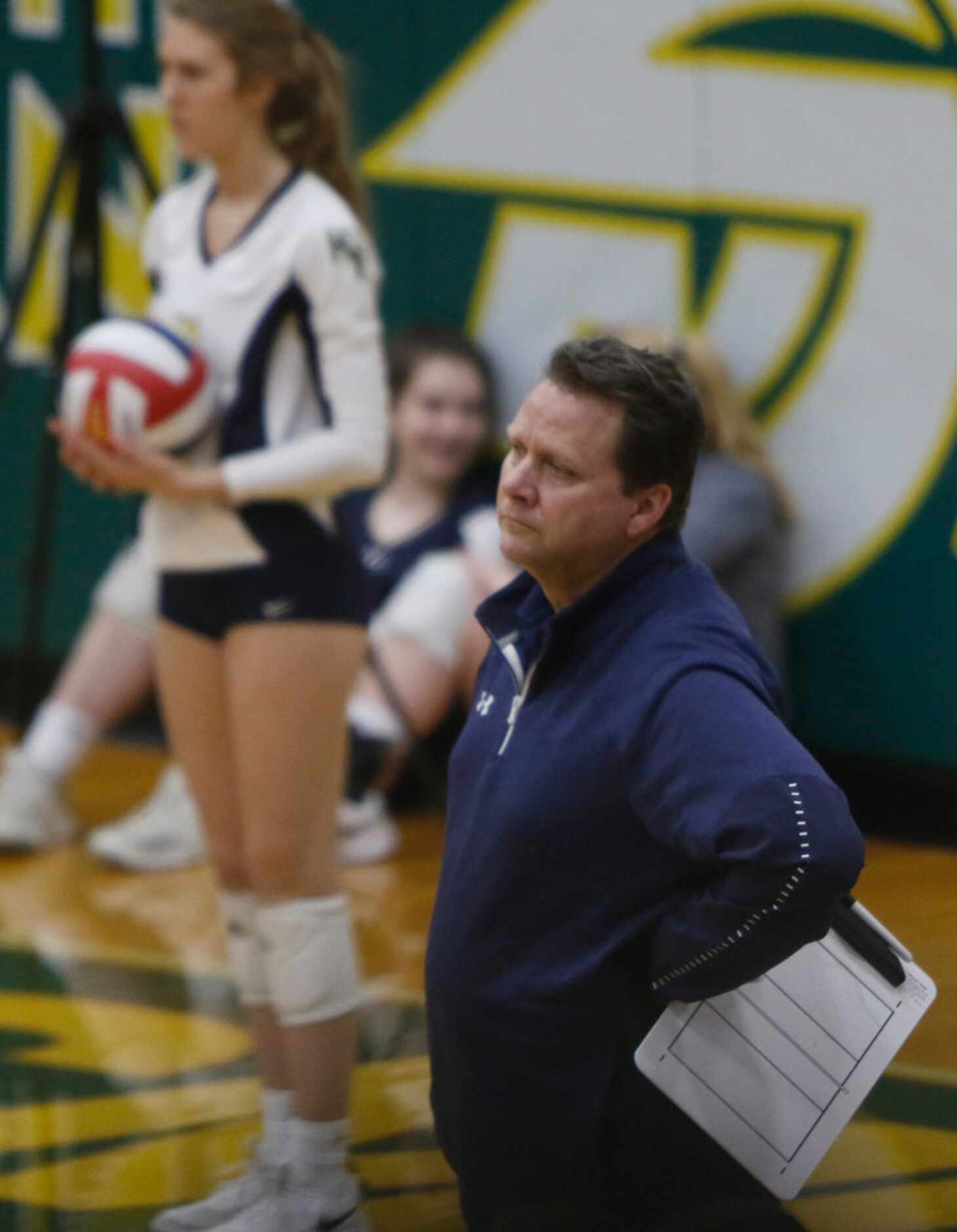 Highland Park head coach Michael Dearman looks on during a brief break in the action of the...